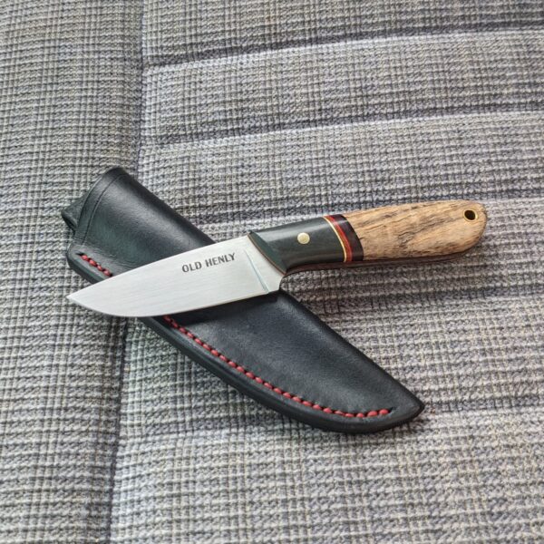 A Heeler knife model with dovetailed bolsters and spalted pecan handle.